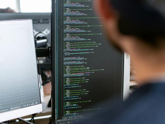 A team reviewing a dashboard during a system integration